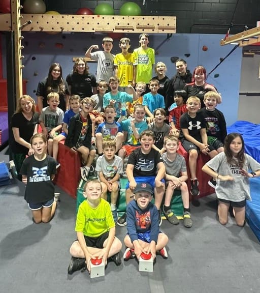 a group of kids at a ninja fit camp at a londonderry fitness center near me